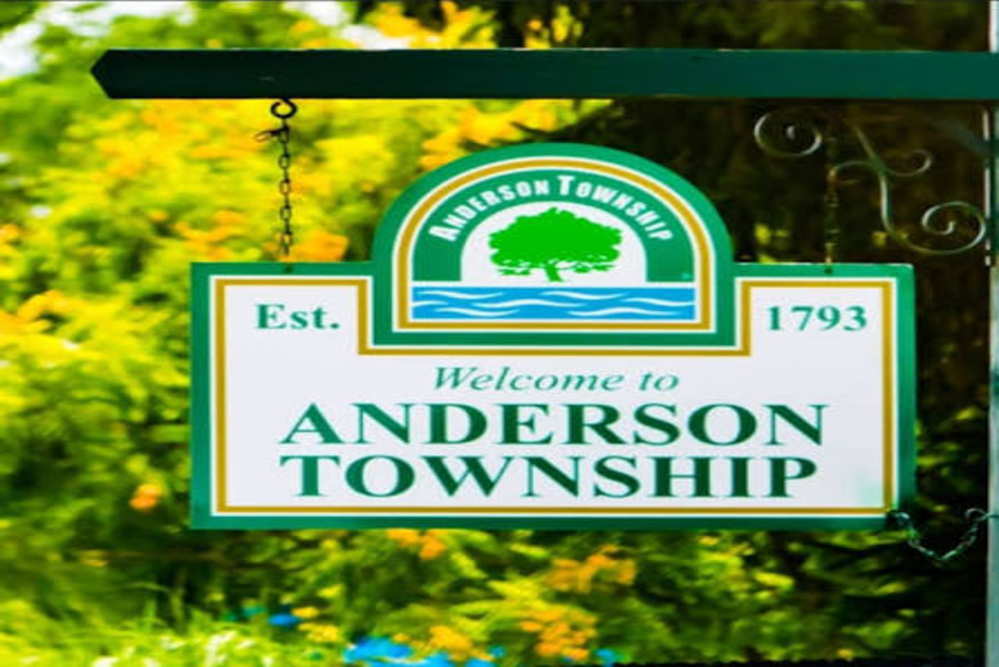 Anderson Township - Elegant Outdoor Lighting Design Welcome sign for Anderson Township, established 1793, with a green-and-gold border and tree emblem near greenery.